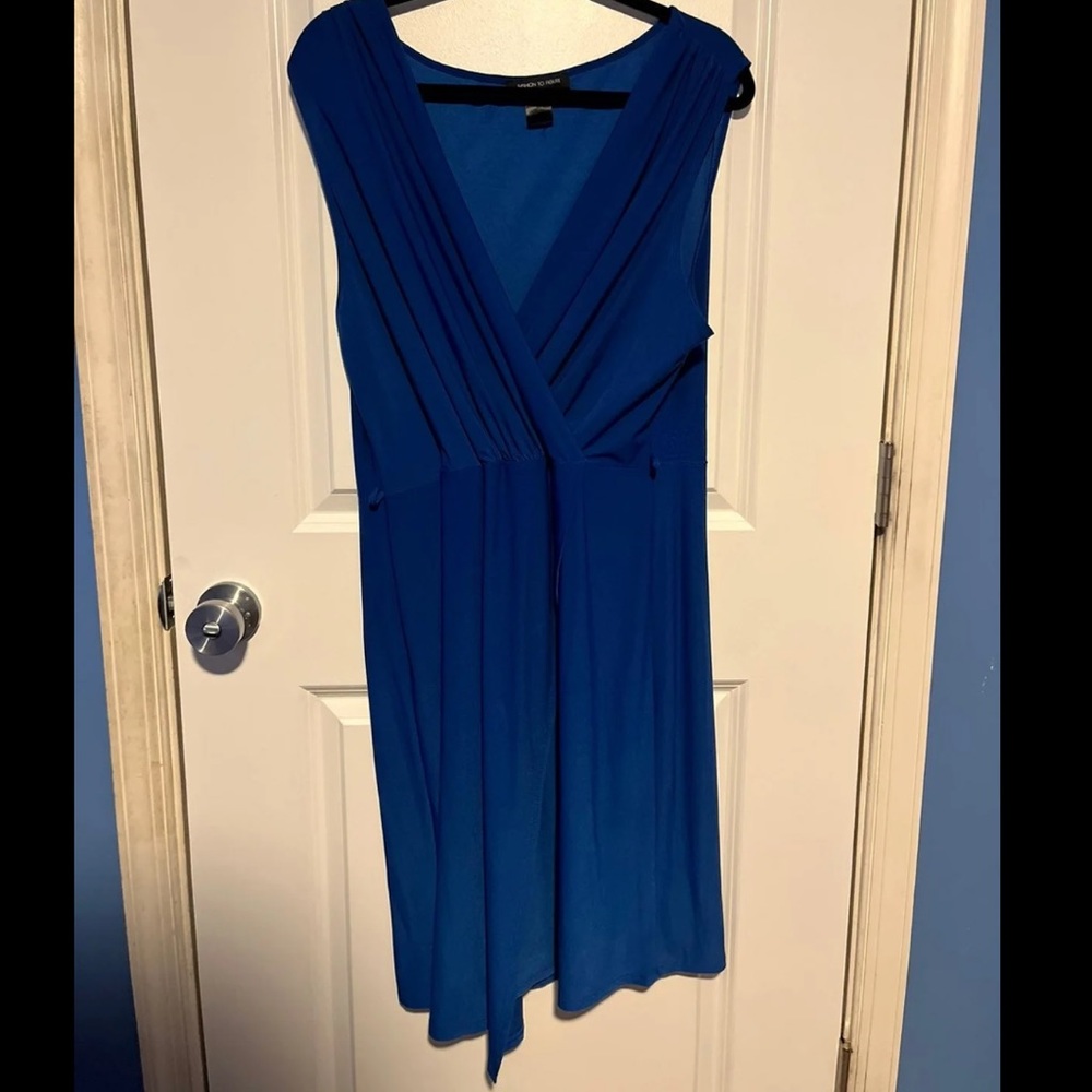 Blue sleeveless faux wrap dress